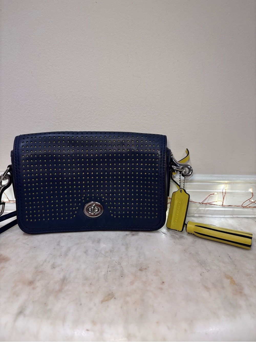 Coach Legacy Perforated Leather Penny crossbody bag in Navy/Bright Citrine